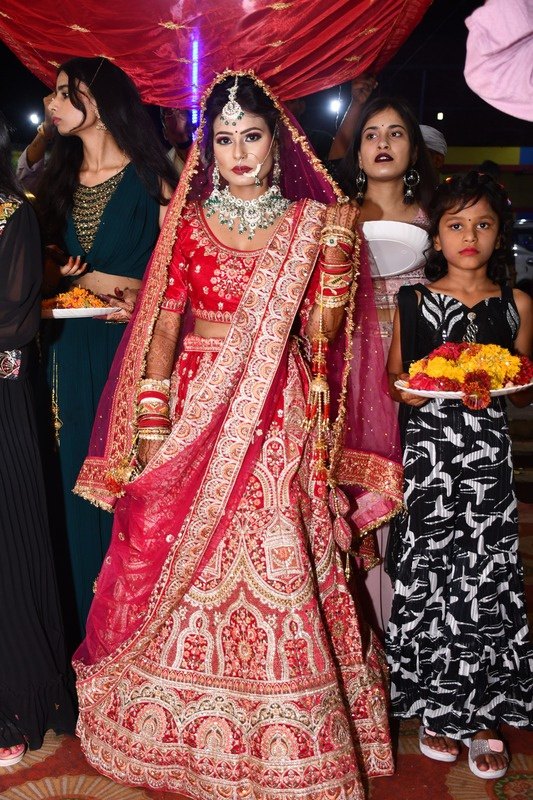 Bride entering with her family